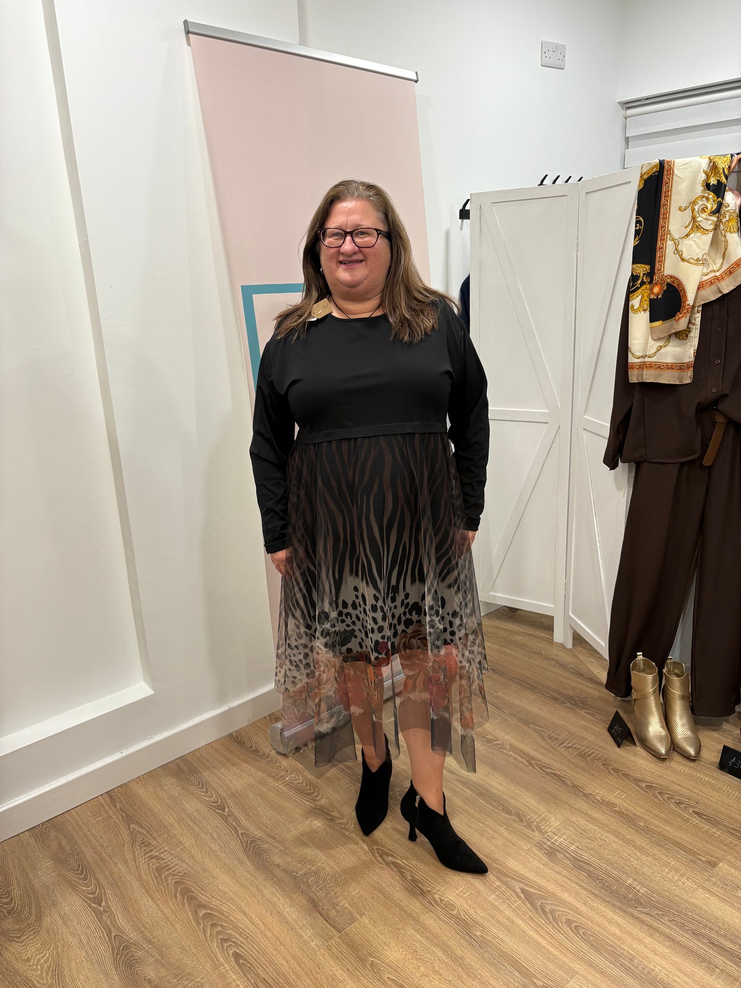 Dress with net overskirt